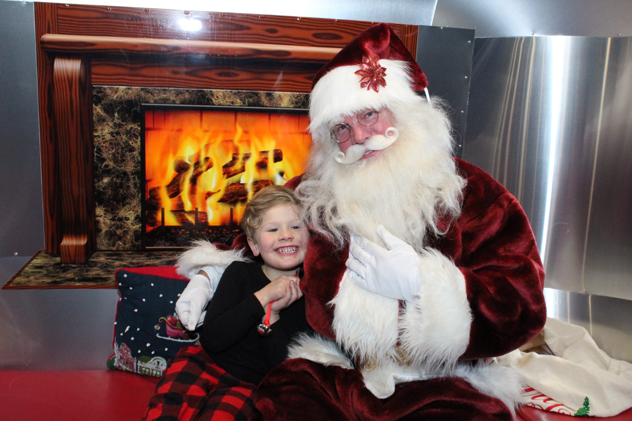 The Polar Express conductor and chefs, dressed in their festive uniforms